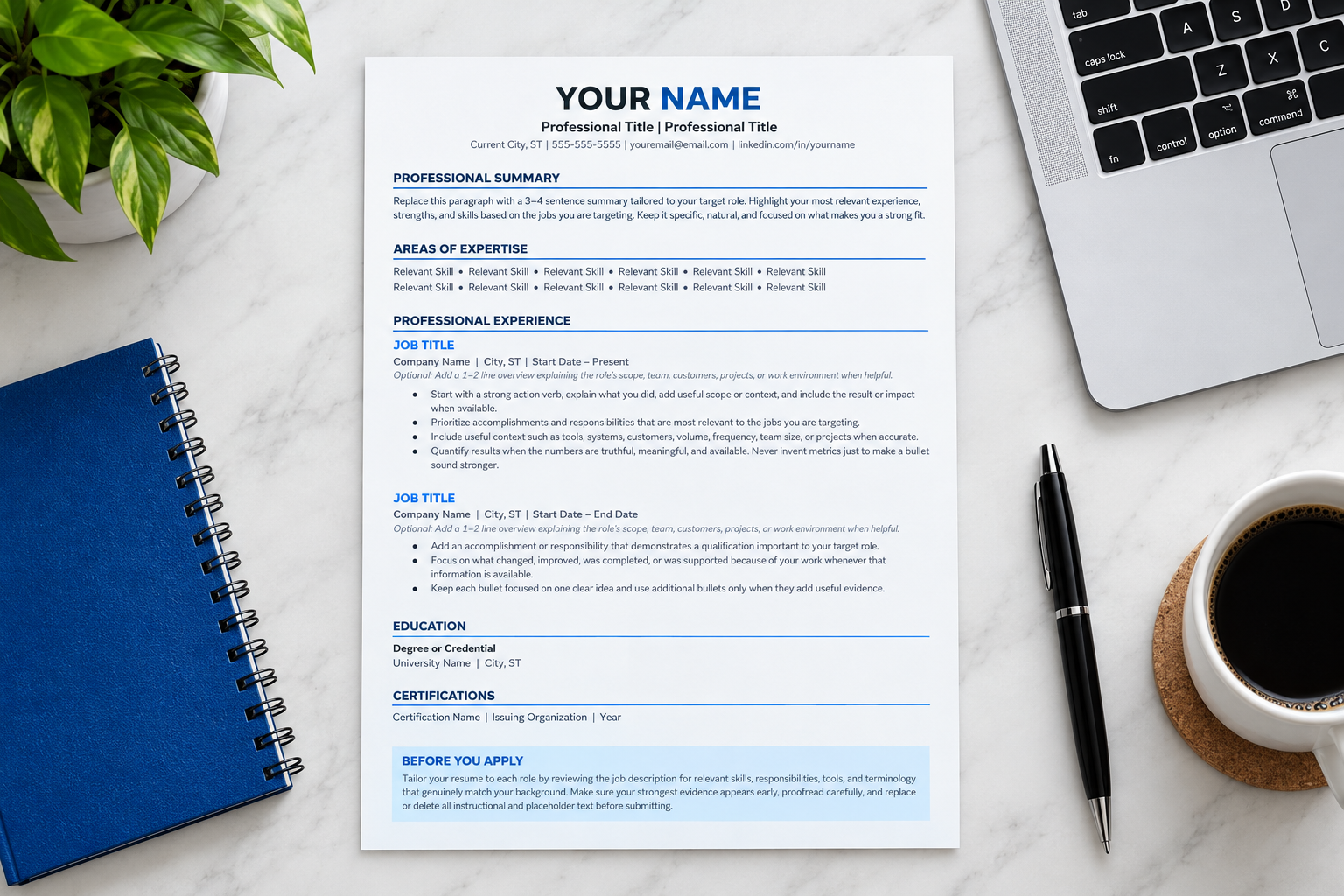 ATS-friendly resume template on a white desk with a notebook, laptop, pen, and coffee